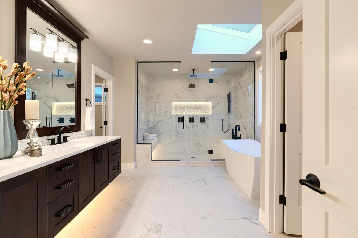 Bathroom with Marble Shower and Dark Wood
